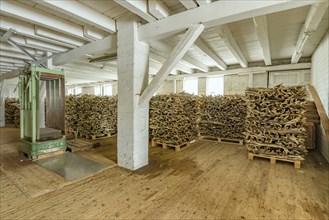 Stockfish dried in a warehouse on pallets