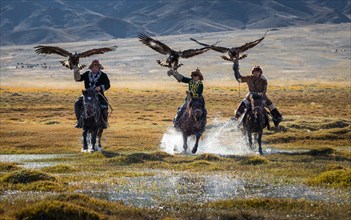 Young eagle hunters. Bayan-Ulgii province