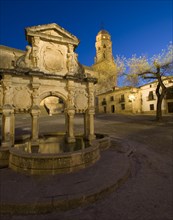 Fountain of Mary and the Cathedral of Baeza at the Blue Hour