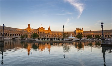 Plaza de Espana in the evening light with reflection in the canal
