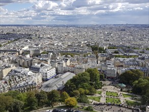 City view of Paris from the Basilica Sacre-Coeur and Louise-Michel-Square