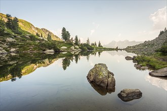 Mirror lake at first light with the Hoher Dachstein in the background