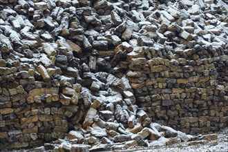 Peat sods in winter with snow