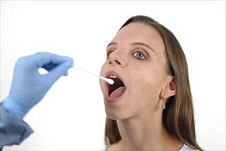 Woman receives throat swab