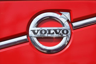 Volvo logo on a red truck