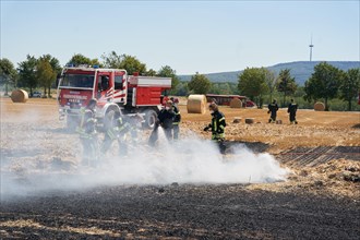 Firefighters fight field fires caused by drought
