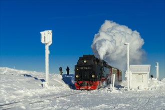 Brocken Railway travels through snowy landscape up the Brocken
