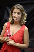Young woman in red dress