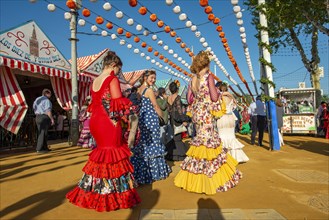Women in colourful flamenco dresses