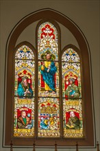 Church window with reformers