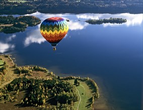 Hot-air balloon above Staffelsee Lake near Uffing