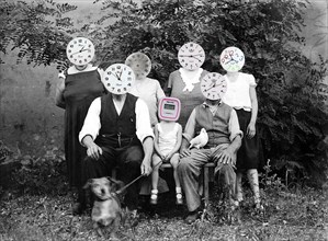 Family with watches as heads