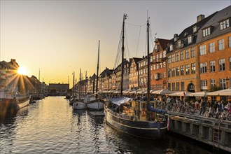 Sunset at the busy Nyhavn Canal