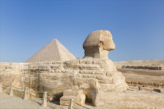 The great Sphinx with the pyramid of Cheops in the background