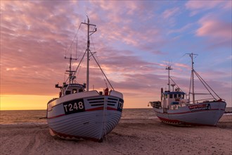 Fishing boats at sunset at the port of Vorupoer