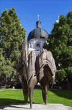 Bronze statue Caldera at Makartplatz with Trinity Church