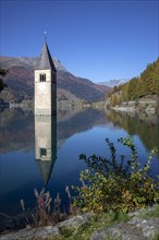 Sunken church tower in the reservoir at the Reschenpass