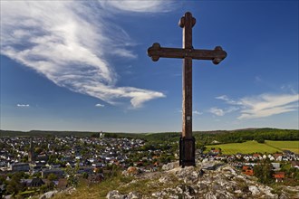 Cross on the Piusberg with view of the city