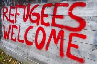 Graffiti REFUGEES WELCOME refugees refugees welcome