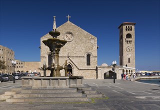 Water fountain and Church of the Evangelismos or Annunciation