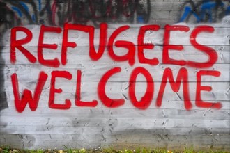 Graffiti REFUGEES WELCOME refugees refugees welcome