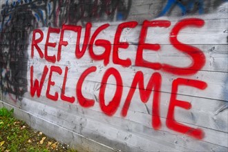 Graffiti REFUGEES WELCOME refugees refugees welcome