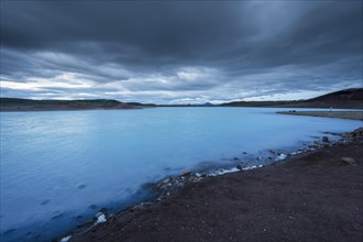 Milky light blue lake Blue Lake at dusk
