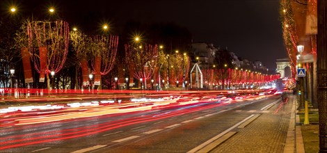 Night shot of the Christmas illumination of the Avenue des Champs-Elysees