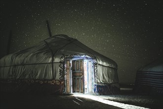 Yurt of eagle hunter Bashakhan Spai at night