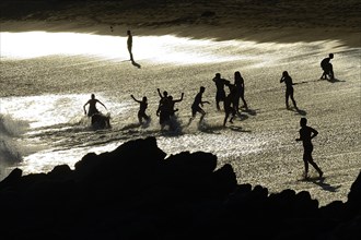 Bathers at the beach of Quebrada de la Huaca