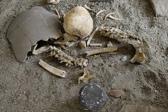 Human bones in a tomb of the Sechin culture