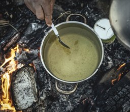 Pea soup on campfire