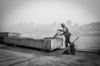 Construction workers on the banks of the Yangtze River