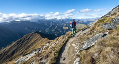 Hiker on the hiking trail to Ben Lomond