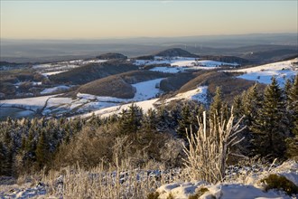 View from the Wasserkuppe over the chain of hills of the Rhoen in winter