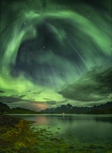 Northern lights over the fjord
