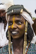 Wodaabe-Bororo man with face painted at the annual Gerewol festival