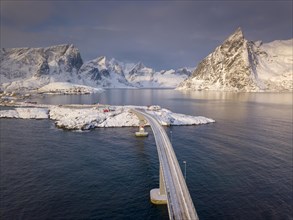 Snowy landscape by the fjord with Hamnoy bridge