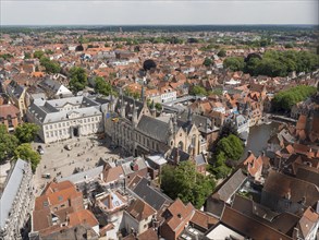 City view from the Belfort of Bruges Tower towards the Holy Blood Basilica and City Hall