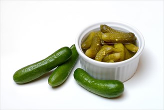 Cornichons in shell and young cucumbers