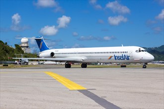 A McDonnell Douglas MD-83 of the island Air with registration number P4-MDG at the airport of St