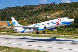 A Boeing 737-800 of Enter Air with the registration SP-ENX and the special painting 100 years of independence at Skiathos Airport