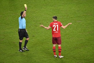 Referee Guido Winkmann draws Salih Oezcan 1 FC Koeln yellow card