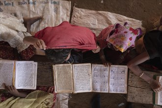 Girls reading in a madrasah