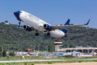 A Boeing 737-800 of Blue Panorama with the registration number 9H-GAW at Skiathos Airport
