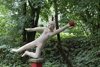 Naked gymnast with ball