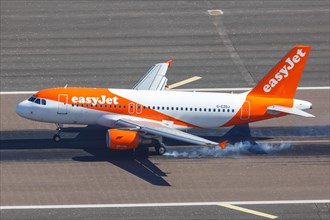 An Easyjet Airbus A319 with the registration number G-EZDJ at Gibraltar Airport