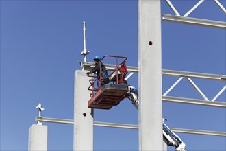 Construction worker on working platform