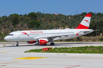 An Airbus A320 of Austrian Airlines with the registration OE-LBQ at Skiathos Airport