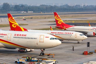 An Airbus A330-300 aircraft of Hainan Airlines with registration number B-8015 at Beijing Airport